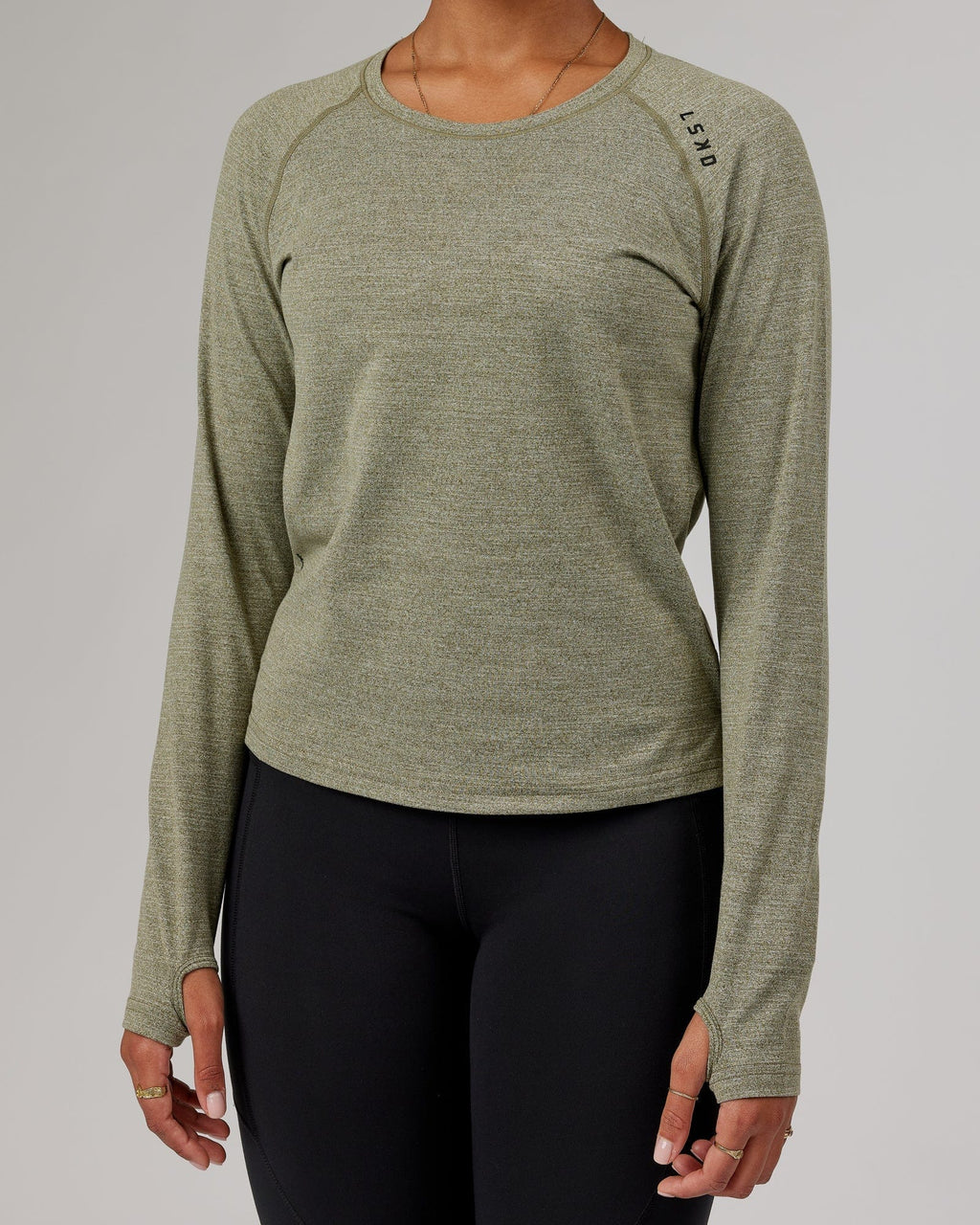 Model wearing Perform VapourFLX LS Tee - Olive Marl