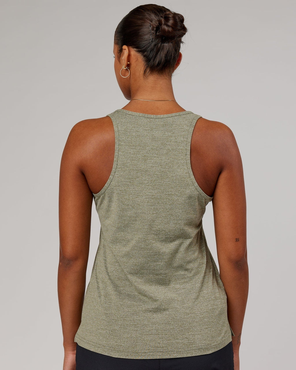Model wearing Perform VapourFLX Tank - Olive Marl