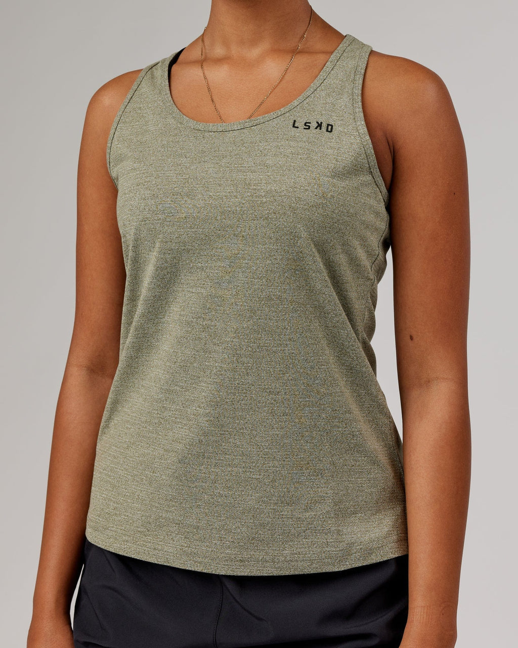 Model wearing Perform VapourFLX Tank - Olive Marl