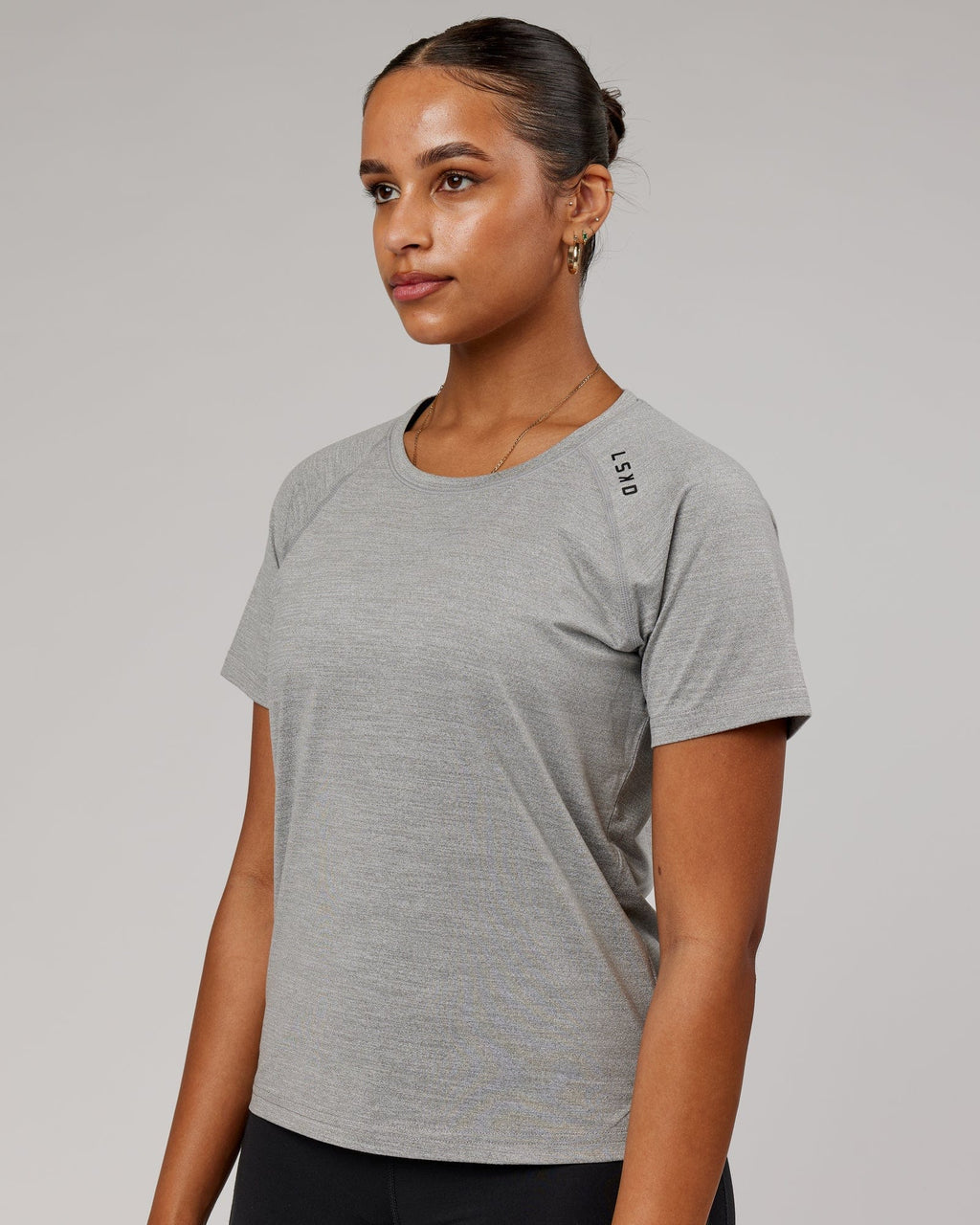 Model wearing Perform VapourFLX Tee - Lt Grey Marl