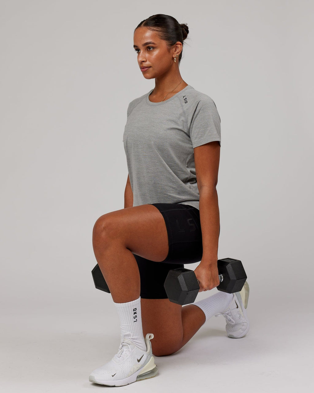 Model wearing Perform VapourFLX Tee - Lt Grey Marl