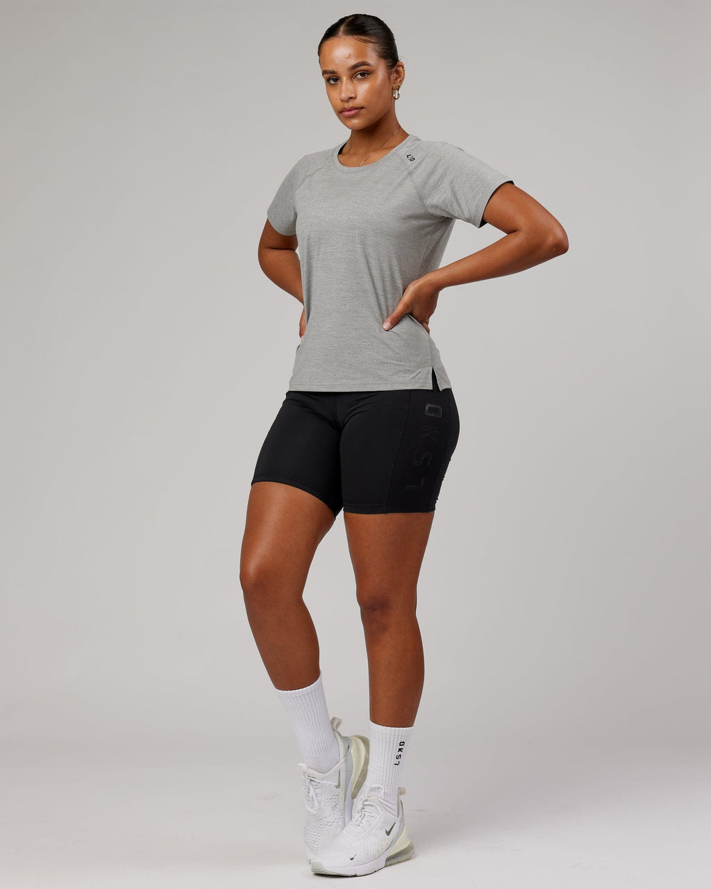 Model wearing Perform VapourFLX Tee - Lt Grey Marl