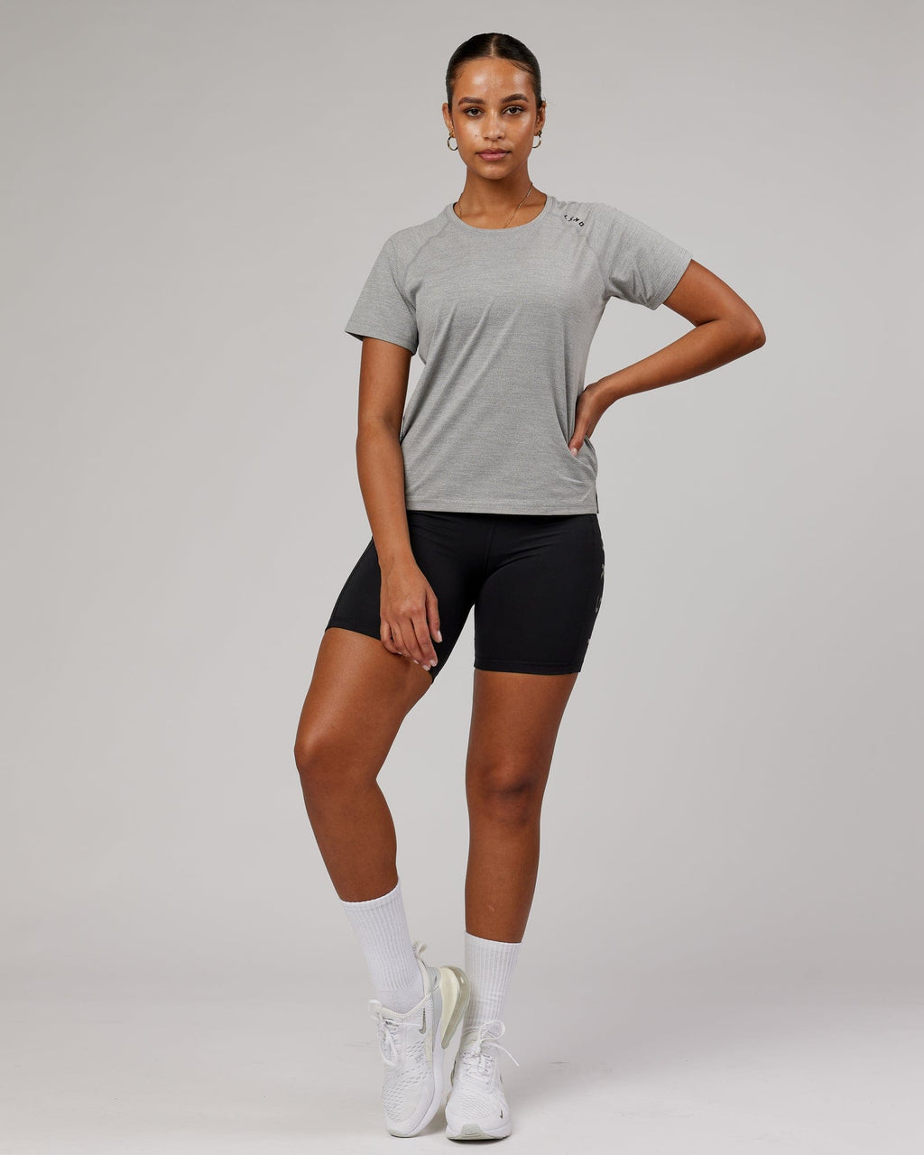 Model wearing Perform VapourFLX Tee - Lt Grey Marl