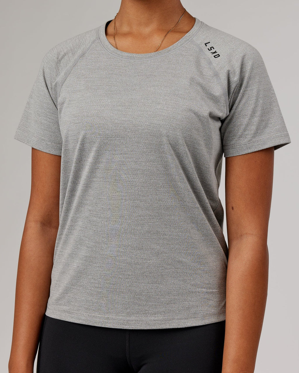 Model wearing Perform VapourFLX Tee - Lt Grey Marl