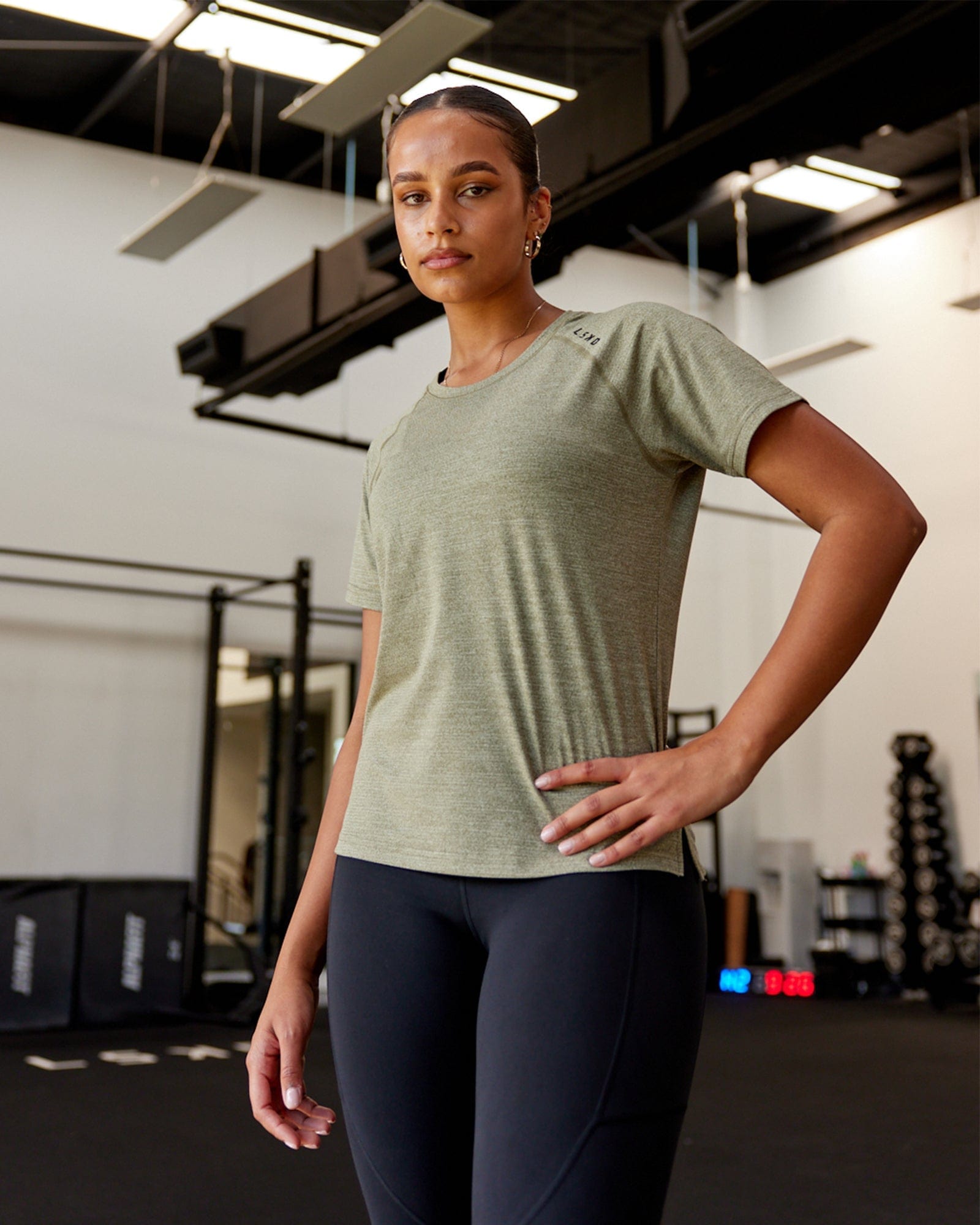 Model wearing Perform VapourFLX Tee - Olive Marl