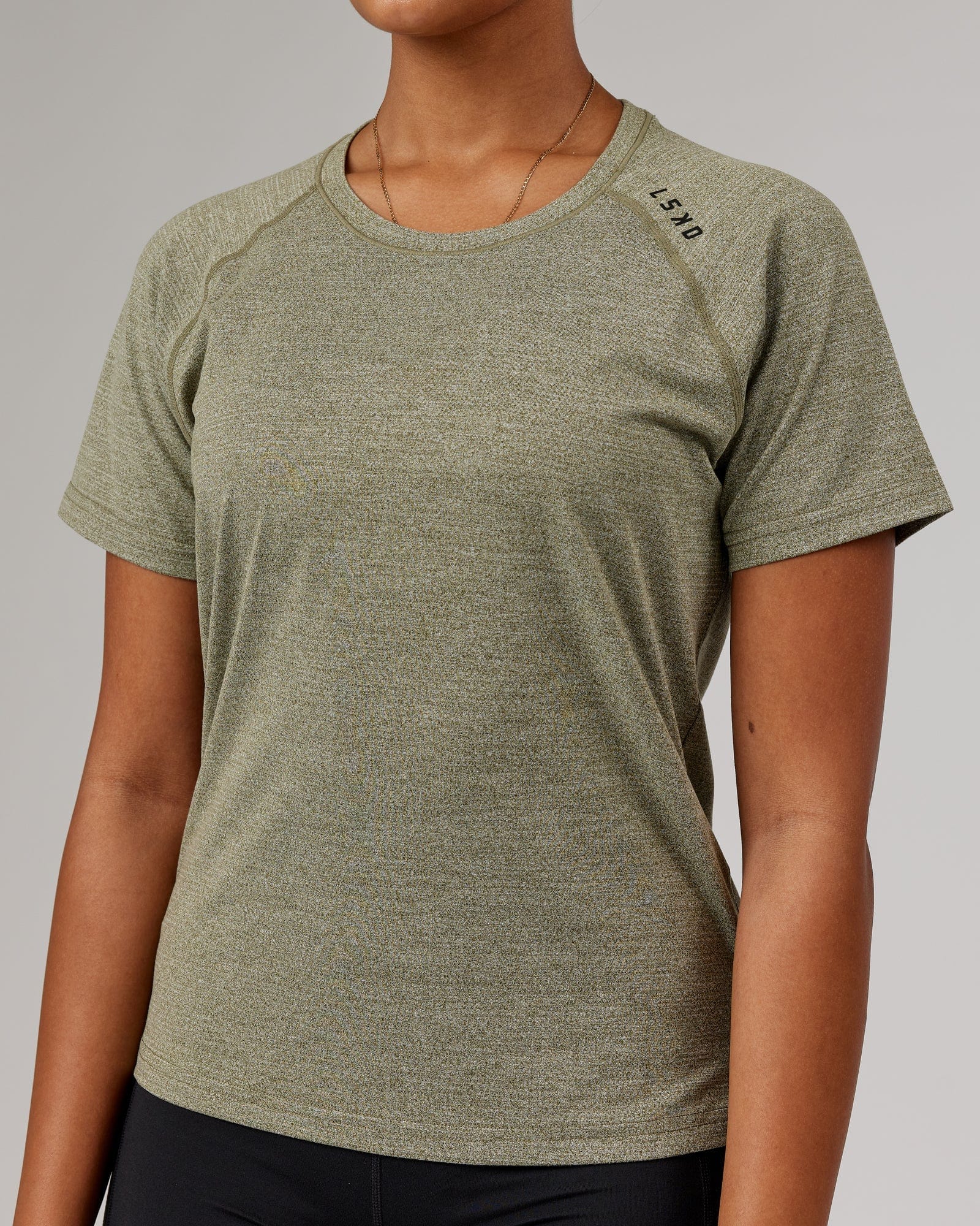 Model wearing Perform VapourFLX Tee - Olive Marl