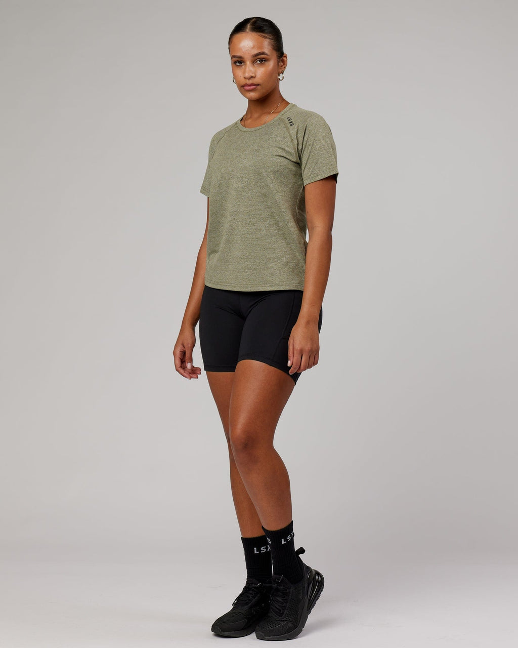 Model wearing Perform VapourFLX Tee - Olive Marl