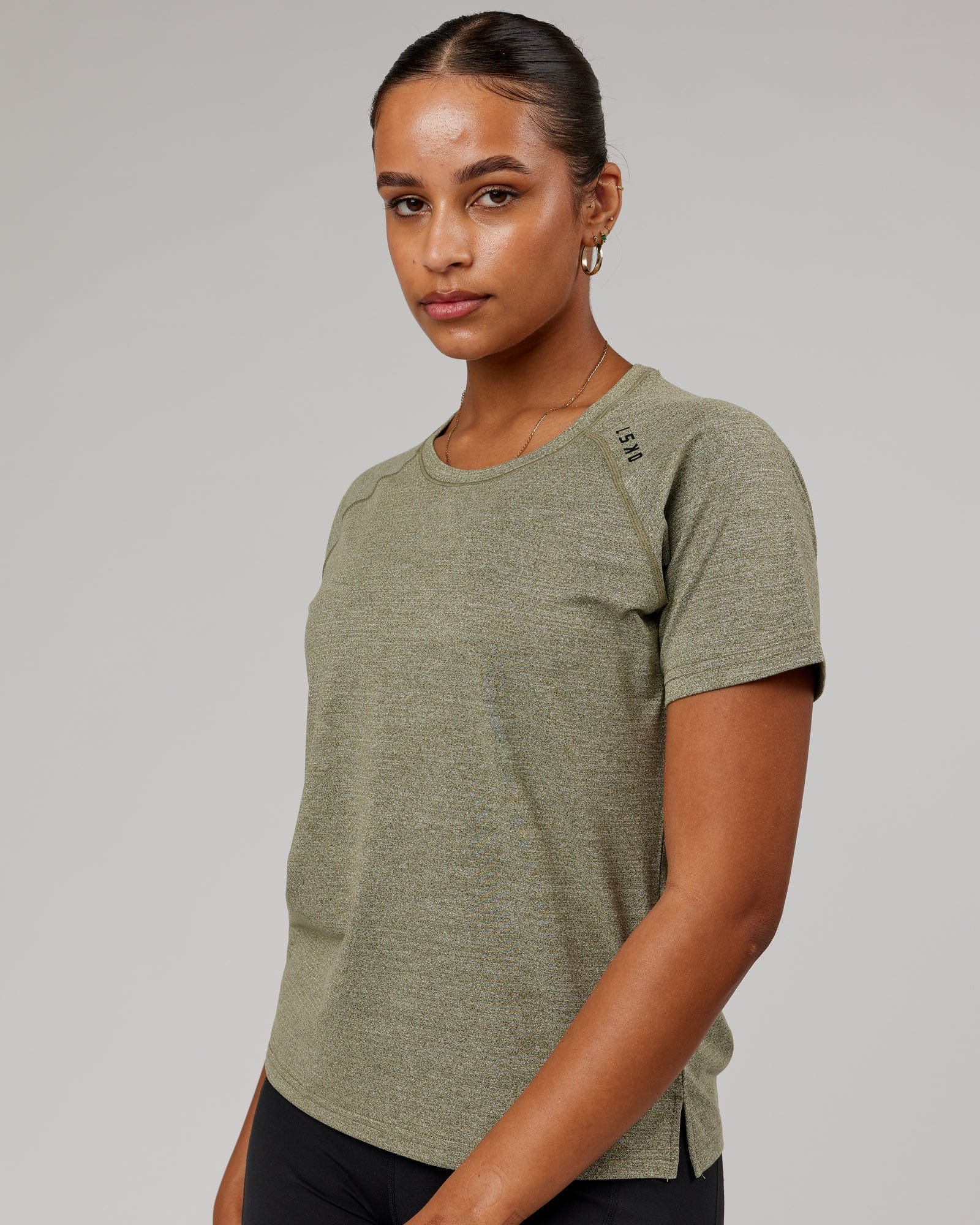 Model wearing Perform VapourFLX Tee - Olive Marl