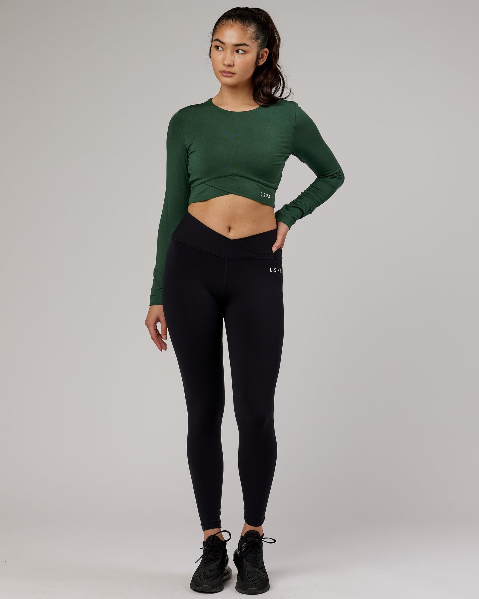 Model wearing Wrapped LS Tee - Pineneedle