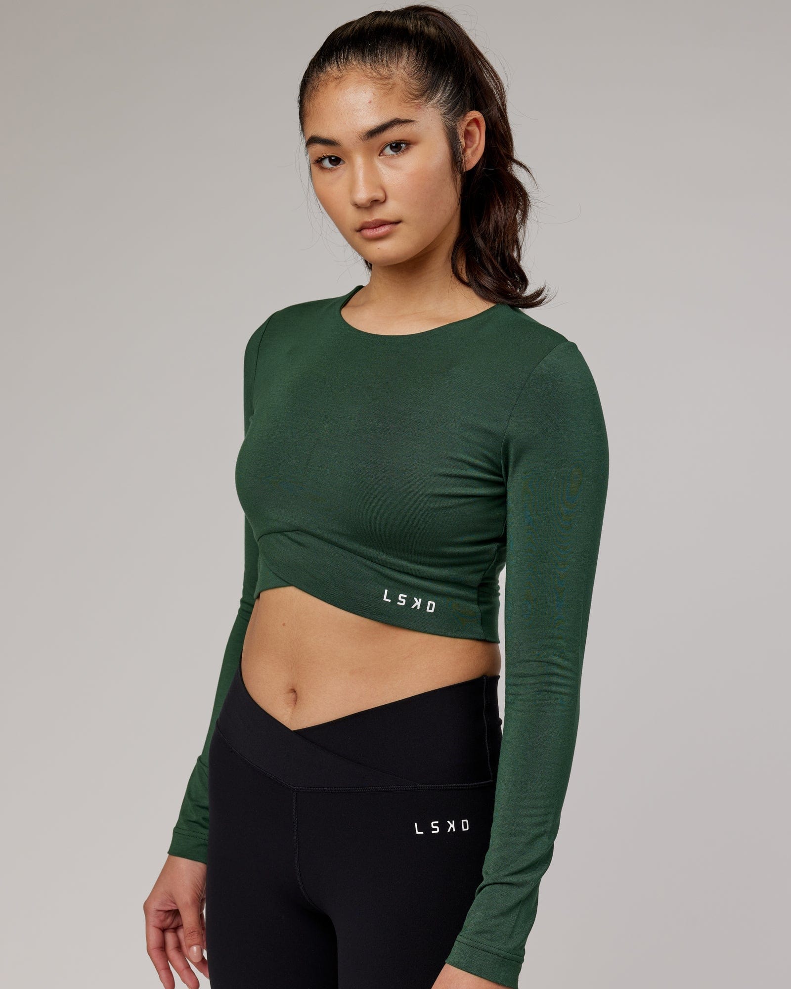 Model wearing Wrapped LS Tee - Pineneedle