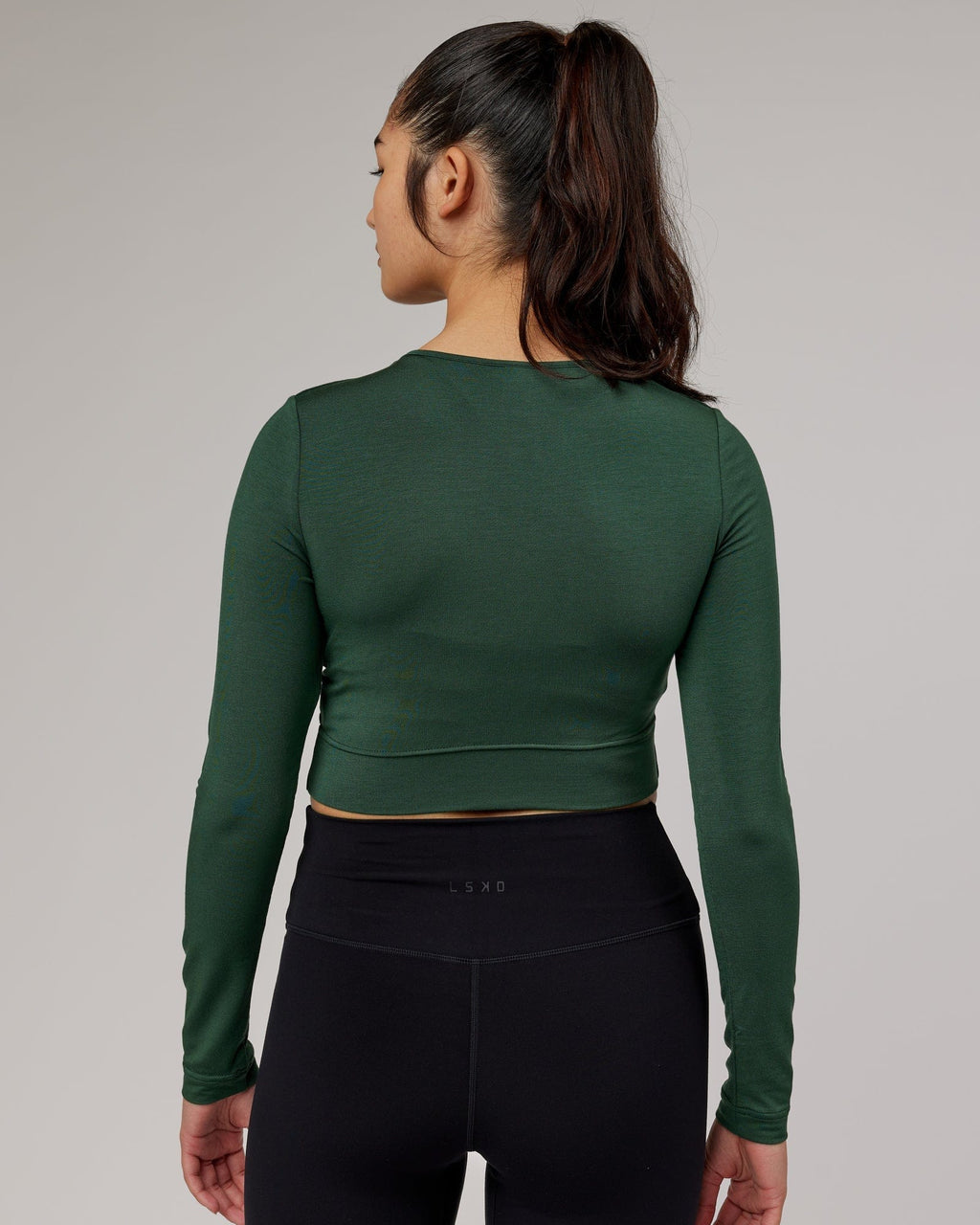 Model wearing Wrapped LS Tee - Pineneedle