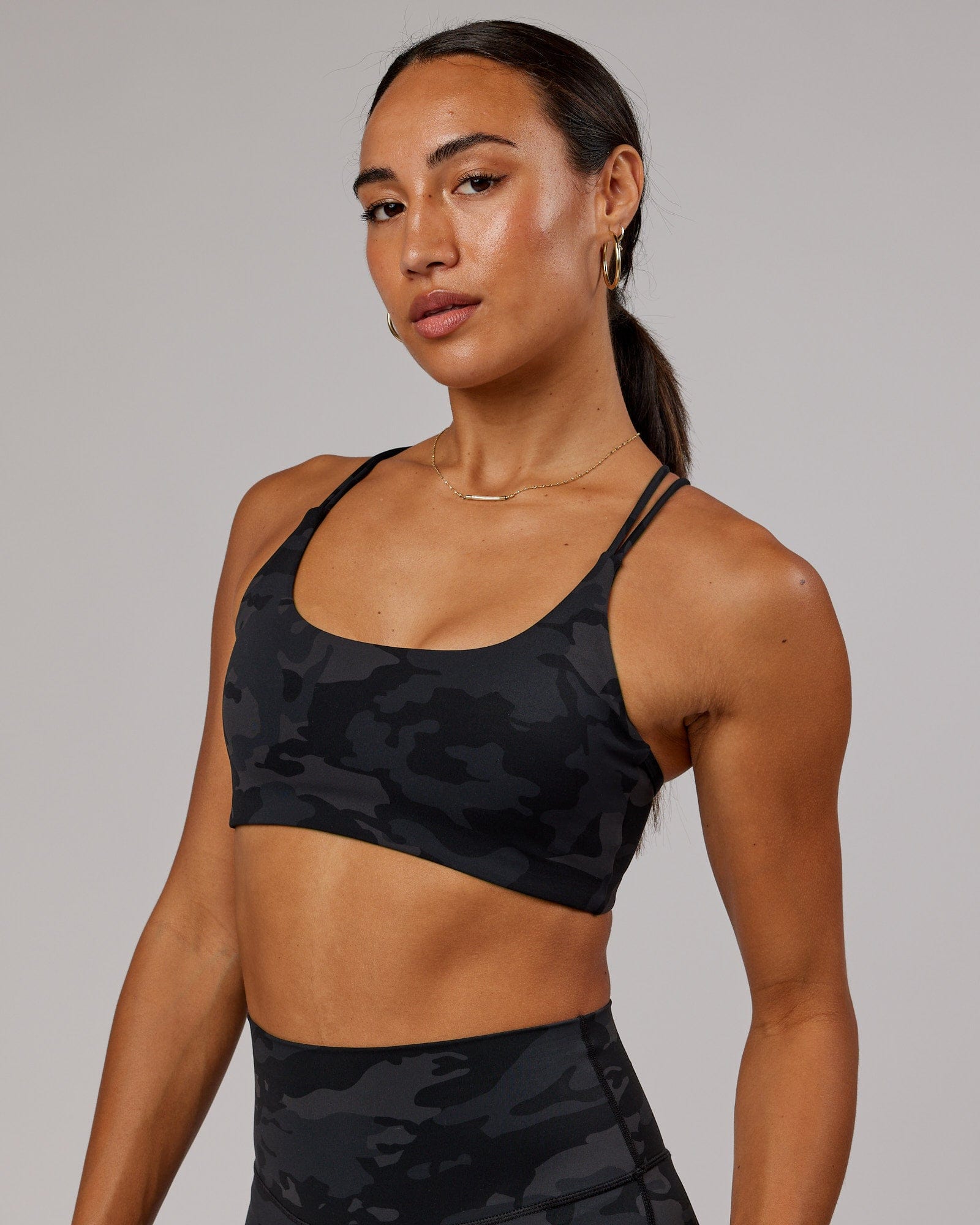 Model wearing Yin Sports Bra - Black Camo