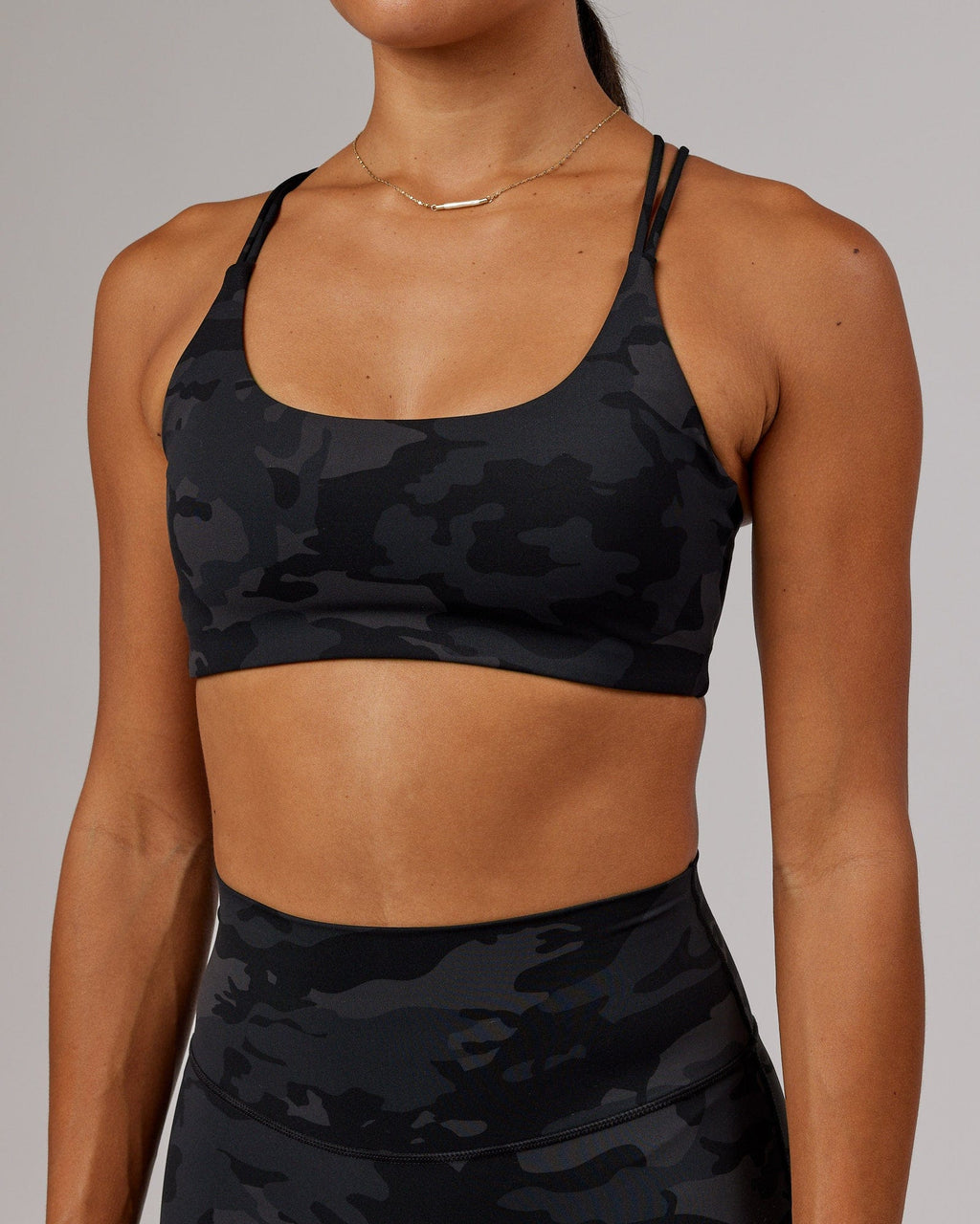 Model wearing Yin Sports Bra - Black Camo